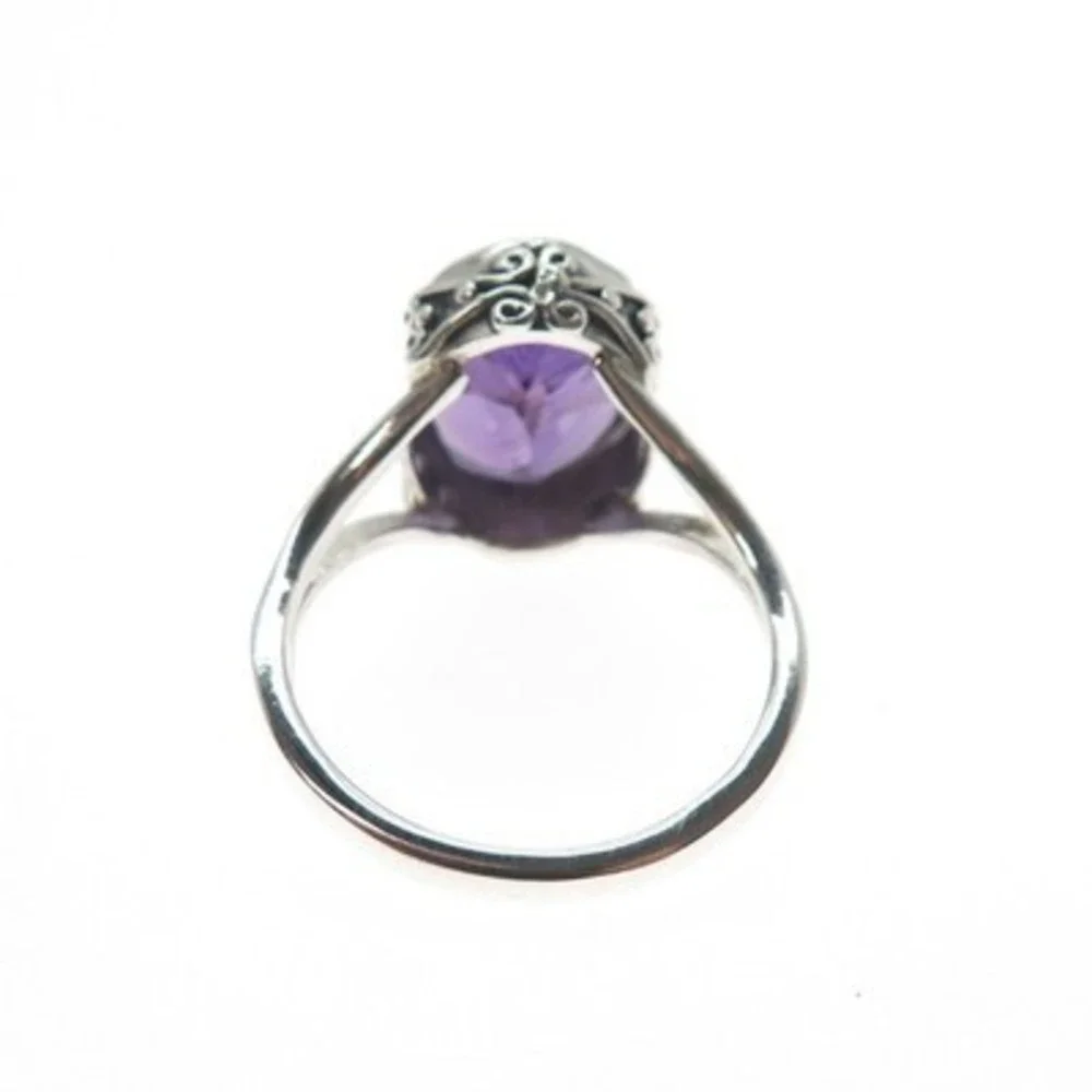 Source Unknown Silver Ring with Deep Purple Oval Gem